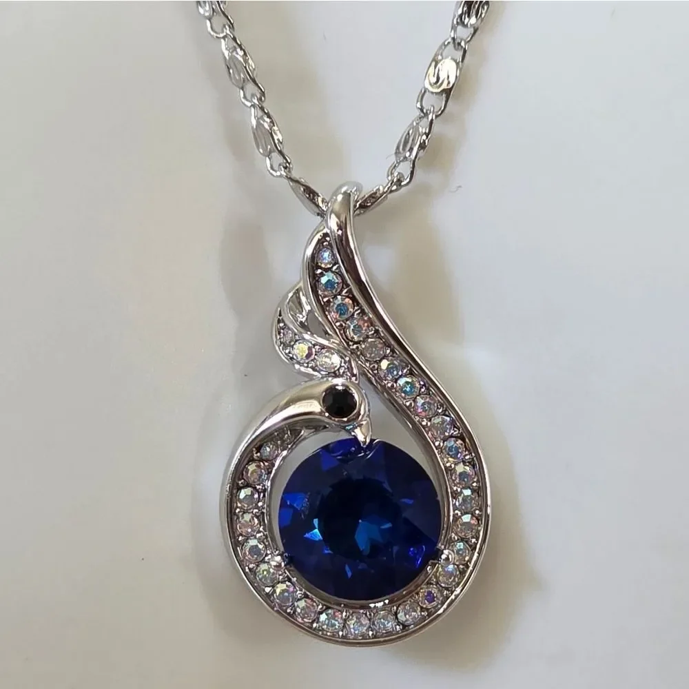 🩵⏭️NIB White Gold Plated Blue Crystal Sapphire Phoenix Pendant Necklace